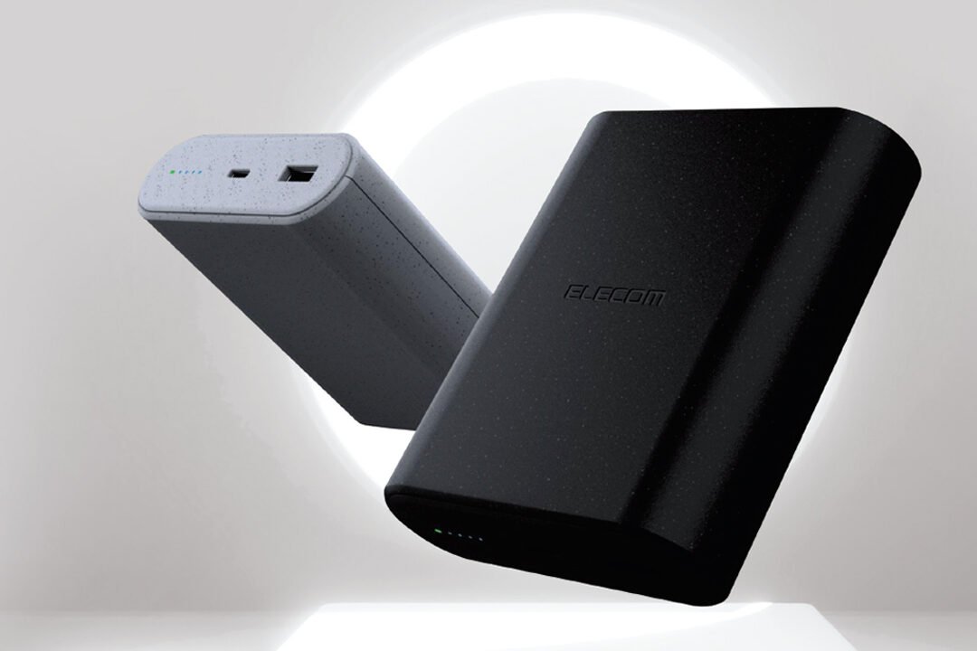 The Elecom Na+ Sodium-Ion Mobile Battery power bank, showcasing its compact design and USB-C/USB-A ports, with a background suggesting sustainability or portable energy.