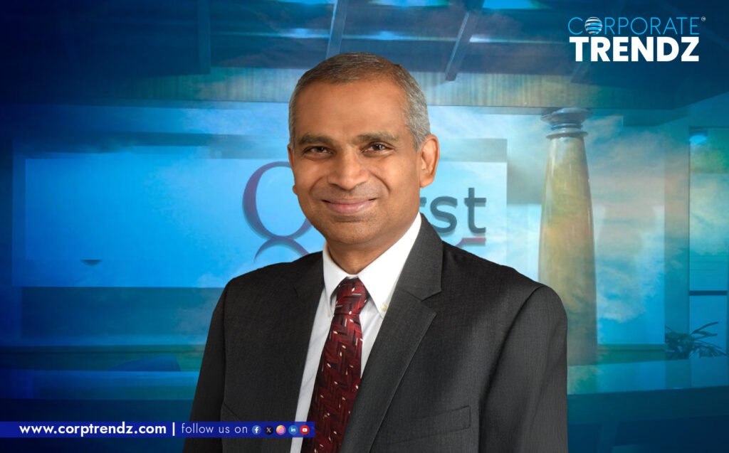 Ashok Harris, the new Interim COO of QBurst, in a professional headshot, signifying his leadership role in a tech company.