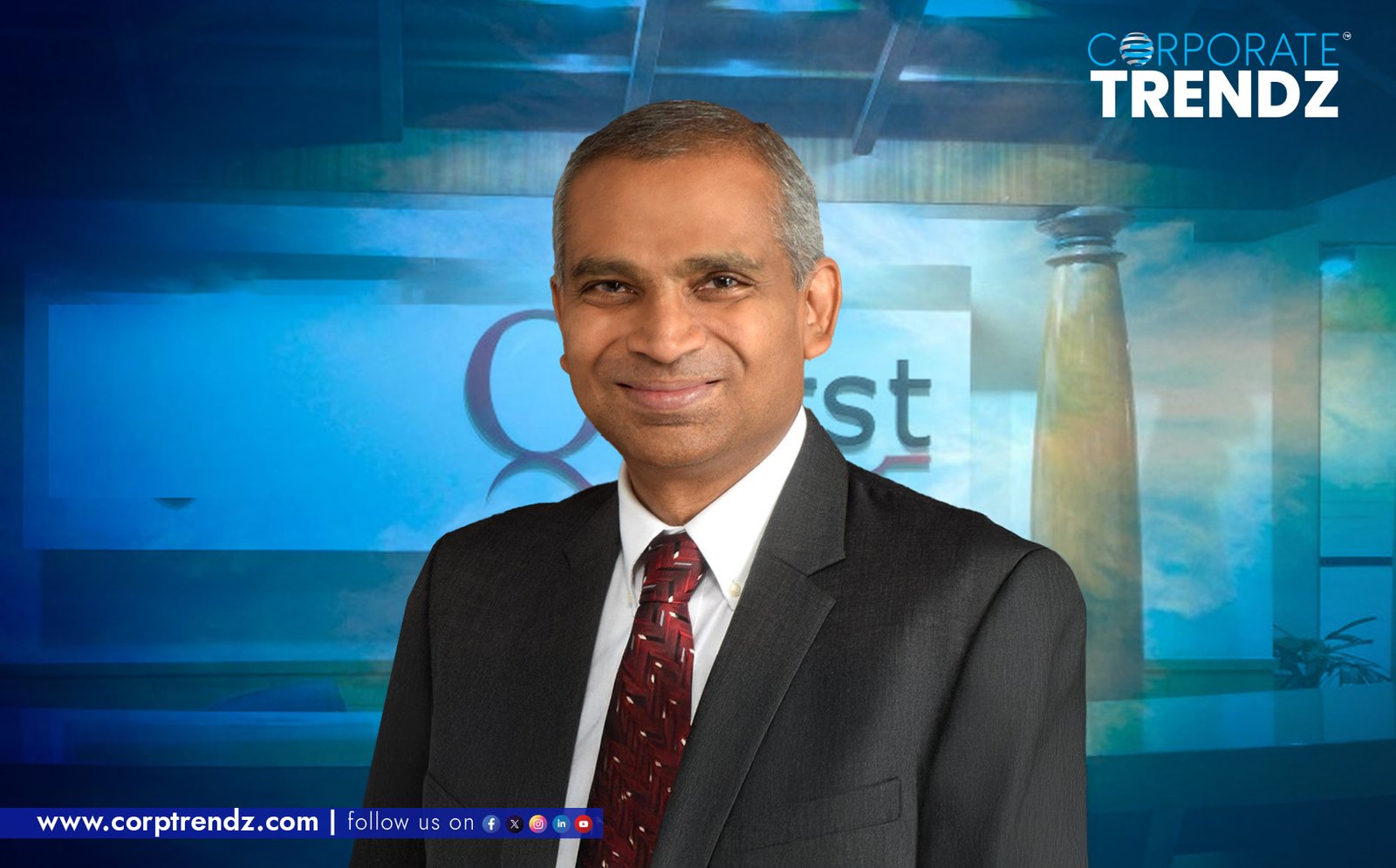 Ashok Harris, the new Interim COO of QBurst, in a professional headshot, signifying his leadership role in a tech company.