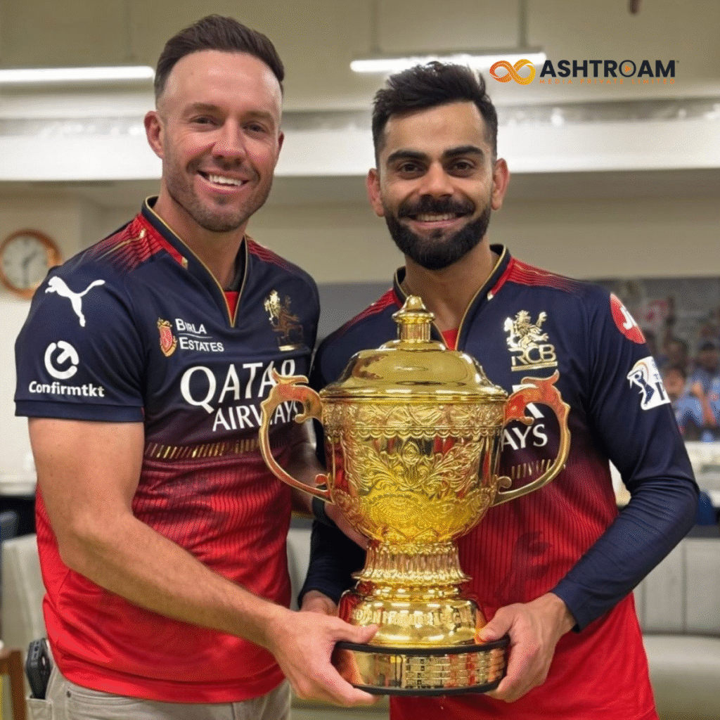 RCB IPL 2025 Champions: Virat Kohli, Rajat Patidar, and team celebrate with the trophy, a historic moment of victory.