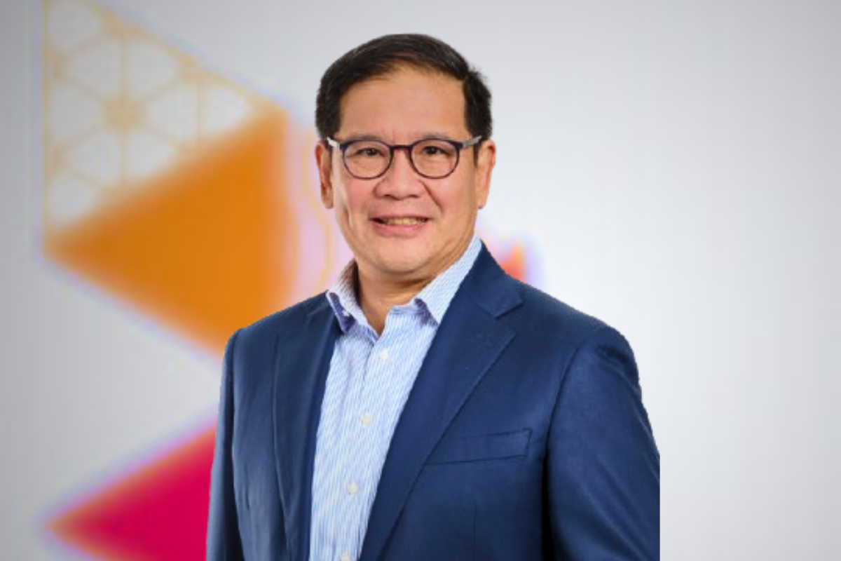 Didi Syafruddin Yahya, a seasoned finance and investment banking professional, in a business suit, looking confident and experienced.