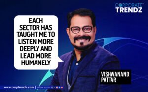 Dr. Vishwanand Pattar, a thought leader and author, with a backdrop reflecting diverse industries, representing his extensive experience and empathetic leadership.