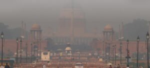 A smog-filled image of a major Delhi landmark, like India Gate or a busy intersection, illustrating the "severe" air quality.
