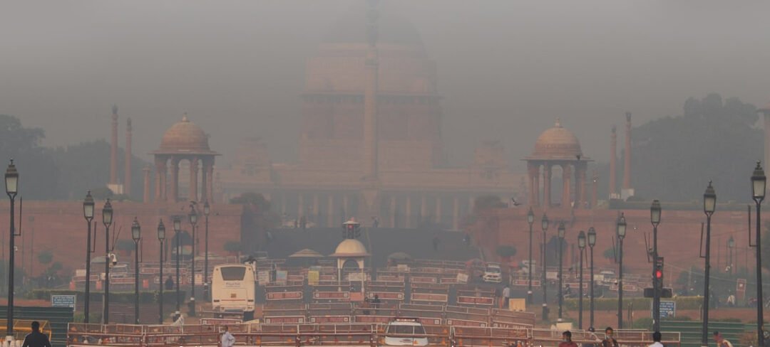 A smog-filled image of a major Delhi landmark, like India Gate or a busy intersection, illustrating the "severe" air quality.